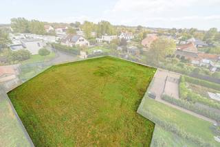 Aan de Houtsaegerlaan in Koksijde-Dorp biedt deze ruime bouwgrond van 11,5 are (1.149 m²) heel wat mogelijkheden. Hier geldt geen...