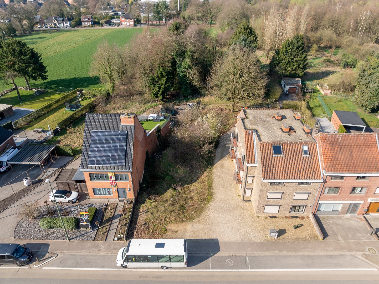 Bouwgrond voor halfopen bebouwing in het centrum van As - foto 2