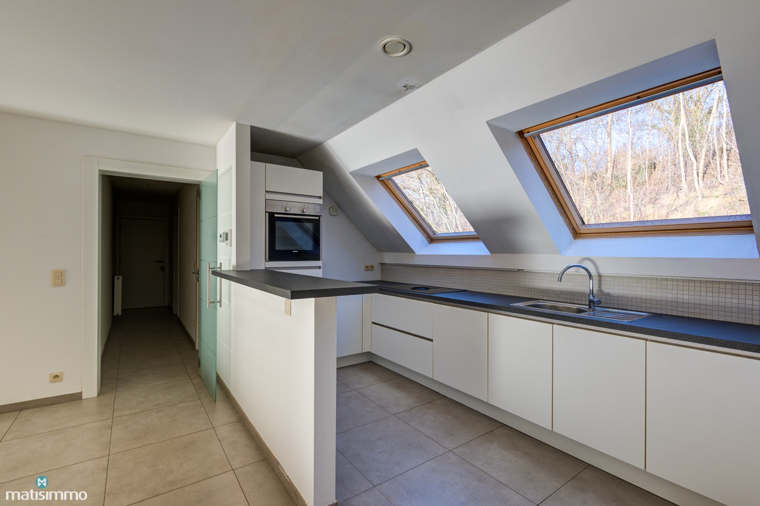 DUPLEXAPPARTEMENT MET 3 SLAAPKAMERS, TERRAS EN ONDERGRONDSE AUTOSTAANPLAATS NABIJ HET CENTRUM VAN BILZEN - foto 5