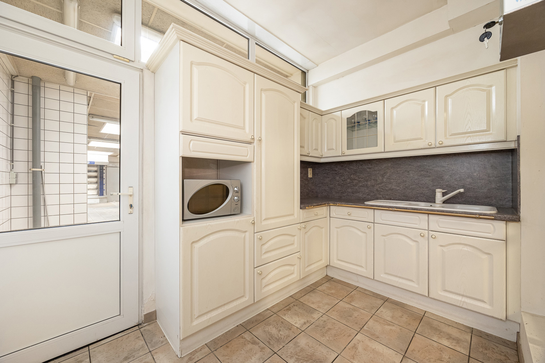 Te renoveren handelspand met woonst in hartje Turnhout - foto 5