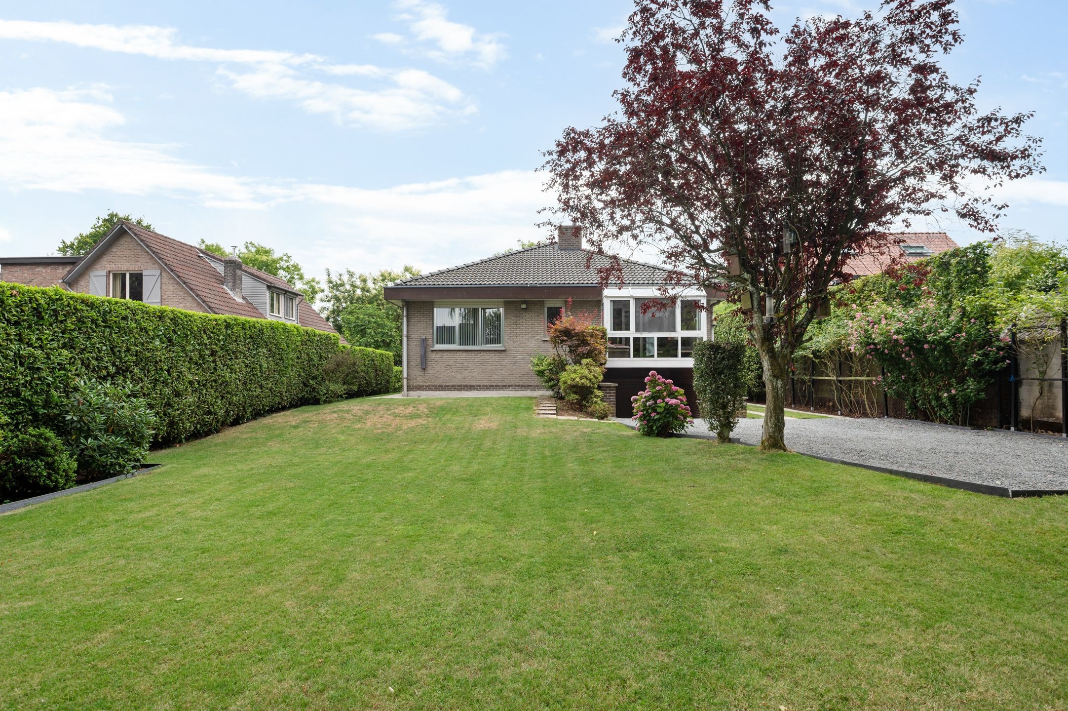 Royale laagbouwwoning met riante leefruimte en grote kelder op toplocatie in De Sterre! - foto 5