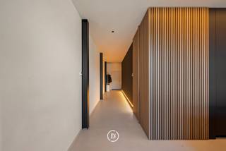 This exclusive duplex loft is part of Loods 23, a high-quality redevelopment project with a rich maritime history, located in a vibrant neighborhood with easy access to the city center and public transportation.<br /><br />The loft features a spacious living area of 191 m² and a sunny terrace of 26 m². A cellar storage is included, and there is the possibility to purchase a private parking space.<br /><br />Layout<br />Through the entrance hall with cloakroom and guest toilet, you enter a home that immediately impresses with its pronounced feeling of light, space, and openness.<br />The ground floor is characterized by high ceilings and includes a spacious living and dining area with an open kitchen and kitchen island. The kitchen is fully equipped with high-quality Miele appliances and has a cozy breakfast nook as an extension of the island. Adjacent is a practical storage room, currently used as a laundry and storage space.<br />The generous sun terrace of 26 m² is a natural extension of the living area.<br /><br />The first floor includes a versatile space (ideal as an office, hobby room), an open bedroom that can be closed off if desired, a full master bedroom, and a luxurious bathroom with a bathtub, walk-in shower, and sink, as well as a separate toilet.<br /><br />The loft is finished with high-quality and durable materials and is equipped with modern techniques including solar panels, air conditioning, mechanical ventilation, etc. The large windows enhance the open loft character and provide a contemporary, stylish look.<br />An exceptional living opportunity for those looking for something special.