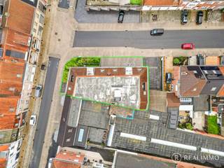 Te koop nabij het centrum van Harelbeke: een kleinschalig en uitstekend onderhouden appartementencomplex met vijf volledig verhuurde...