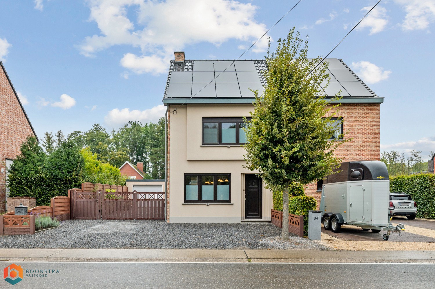 Verzorgde woning met 2 slpkrs, leuke tuin en garage - foto 1