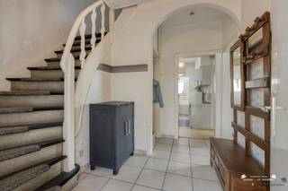<p><span>This well-maintained and spacious family home, with no less than 228 m² of living space, is situated on a lot of 5 are 25 centiare, near the center of Zonhoven. Thanks to its convenient location, spacious layout, and various renovations, this home offers many advantages.</span></p><p><span> </span></p><p><span>The home was built in 1953 and has been modernized in key areas over the years. For example, in 2015, the roof was replaced and fitted with 16 cm of insulation, new Velux skylights were installed, and the gutters were replaced with zinc ones. Furthermore, the home was equipped with a new Vaillant gas boiler in 2019, cavity wall insulation and 21 solar panels with an inverter in 2022, and, most recently, electric roller shutters in 2024.</span></p><p><span> </span></p><p><span>These investments have helped the home achieve an EPC rating of B, making it not only spacious and comfortable but also highly energy-efficient.</span></p><p><span> </span></p><p><span>Upon entering, you are welcomed into a pleasant entryway. From here, you reach the spacious living area, which enjoys a pleasant flow of natural light thanks to the large windows. The cozy sitting area serves as a lovely central gathering space for the whole family.</span></p><p><span> </span></p><p><span>The ground floor also features a kitchen, a practical storage/laundry room, a separate toilet, and a spacious in-home garage. This garage not only accommodates a car but also provides additional storage space.</span></p><p><span> </span></p><p><span>The first floor features three bedrooms and a bathroom. The bathroom provides access to the spacious attic. This space offers interesting possibilities for expansion and, with the necessary renovations, can be converted into one or two additional bedrooms, a hobby room, an office, or a multipurpose space.</span></p><p><span> </span></p><p><span>This home also has a lot to offer outdoors. The spacious and fully fenced yard is ideal for families, children, and pets and offers the necessary privacy. In addition, parking is available alongside the house.</span></p><p><span> </span></p><p><span>Numerous renovations and energy-efficient features</span></p><p><span>Living area: 228 m² according to the EPC</span></p><p><span>Lot size: 5 are 25 centiare</span></p><p><span>Year built: 1953</span></p><p><span>Renovations: 2015  2019  2022</span></p><p><span>EPC rating: B</span></p><p><span>New roof</span></p><p><span>16 cm of roof insulation</span></p><p><span>New Velux skylights</span></p><p><span>Zinc gutters (2015)</span></p><p><span>Cavity wall insulation</span></p><p><span>New Vaillant gas boiler (2019)</span></p><p><span>21 solar panels + inverter (2022)</span></p><p><span>Electric roller shutters (2024)</span></p><p><span>3 bedrooms</span></p><p><span>Spacious attic with potential for 1 to 2 additional bedrooms</span></p><p><span>Spacious in-house garage</span></p><p><span>Parking available next to the house</span></p><p><span>Fully fenced yard</span></p><p><span>Asbestos-safe</span></p><p><span>Electrical system up to code</span></p><p><span>Ideal location</span></p><p><span> </span></p><p><span>The home is located near the center of Zonhoven, making shops, schools, and other daily amenities easily accessible. The location is also attractive for commuters thanks to the quick connection to the E314, Hasselt, and Houthalen.</span></p><p><span> </span></p><p><span>EPC: B</span></p><p><span>EPC unique code: 20260818-0003932016-RES-1</span></p><p><span> </span></p><p><span>A spacious and well-maintained family home with 228 m² of living space, a beautiful garden, an in-home garage, three bedrooms, and plenty of potential in the attic. Thanks to the renovations and energy-efficiency upgrades already completed, this home is ready for the future.</span></p><p><span> </span></p><p><span>Interested? For more information or to schedule a viewing, please don’t hesitate to contact us at 011 199 991 or info@janssenenjanssen.be.</span></p>