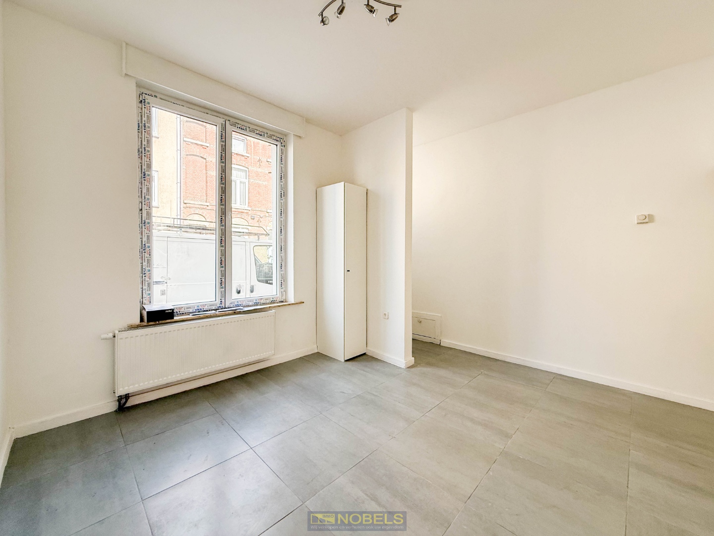 Te koop, opgefriste stadswoning op een gunstige locatie te Gent - foto 3