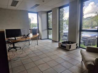 <p>For rent: a versatile complex offering <strong>650 m² of modern office space</strong> and <strong>2,280 m² of warehouses</strong>, with an additional <strong>800 m² mezzanine</strong>. Ideally located at <strong>Parc Industriel 21, 1440 Braine-le-Château</strong>, this property provides a turnkey solution combining <strong>administration, storage, and logistics</strong>.</p>
<p><strong>Key features:</strong></p>
<ul>
<li>
<p><strong>Offices 650 m²</strong>: bright, flexible layout with open space, 8 private offices, air conditioning included.</p>
</li>
<li>
<p><strong>Warehouses 2,280 m²</strong> + <strong>800 m² mezzanine</strong>: suitable for storage, production, or logistics activities.</p>
</li>
<li>
<p><strong>Excellent accessibility</strong>: direct connections to major highways and transport hubs.</p>
</li>
<li>
<p><strong>Professional environment</strong>: located in a thriving industrial park with strong business synergies.</p>
</li>
<li>
<p><strong>Charges</strong>: provision of €1,000 for electricity.</p>
</li>
<li>
<p><strong>Parking</strong>: large onsite parking for staff and visitors.</p>
</li>
</ul>
<p>A strategic location that combines comfort, efficiency, and logistical performance – the perfect base for your company’s growth.</p>