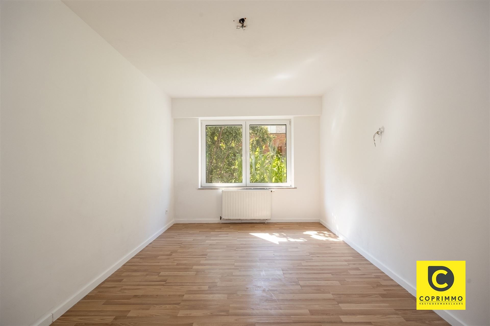 Instapklaar 3slpk appartement met tuin en garagebox ! - foto 5