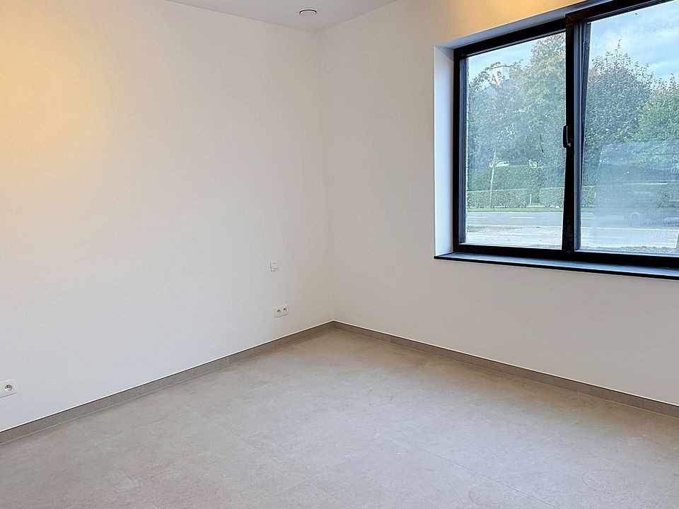 Stijlvol en energiezuinig gelijkvloers nieuwbouwappartement in Deurle. - foto 4