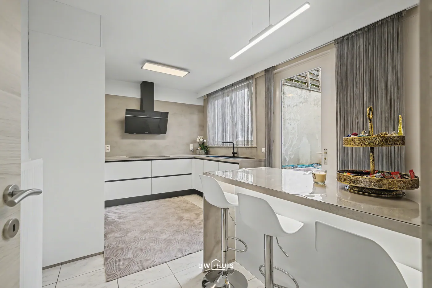 Gerenoveerde woning met 4 slaapkamers en dakterras in centrum Beveren - foto 2