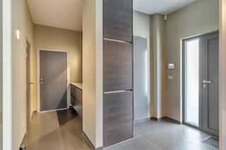 On the ground floor, the house has an office or practice room with a separate entrance, ideal for those who want to combine living and working. The ground floor also includes a spacious living room with an open, fully equipped kitchen, a separate guest toilet and a practical laundry/storage room.On the first floor, there are three full bedrooms and two bathrooms. The finished attic offers additional options and can be perfectly arranged as a fourth bedroom, with the potential for a fifth bedroom or hobby room.The technical installations were also renewed during the renovation, so that the house meets today's housing requirements.Outside, you can enjoy a fully enclosed garden with lots of privacy, ideal for families and lovers of peace and outdoor life.Are you looking for a spacious family home in Diepenbeek or do you want to combine living and working under one roof? Feel free to contact us for an on-site visit at 011 30 50 54 or ines.bollen@dewaele.com.The property is offered through the Pre-sale formula. On 19/06/2026 between 15:30 and 17:30, you can come visit the property by appointment and make an offer. The listed price is a starting price. For further information, please contact the property agent.Register of measures: no