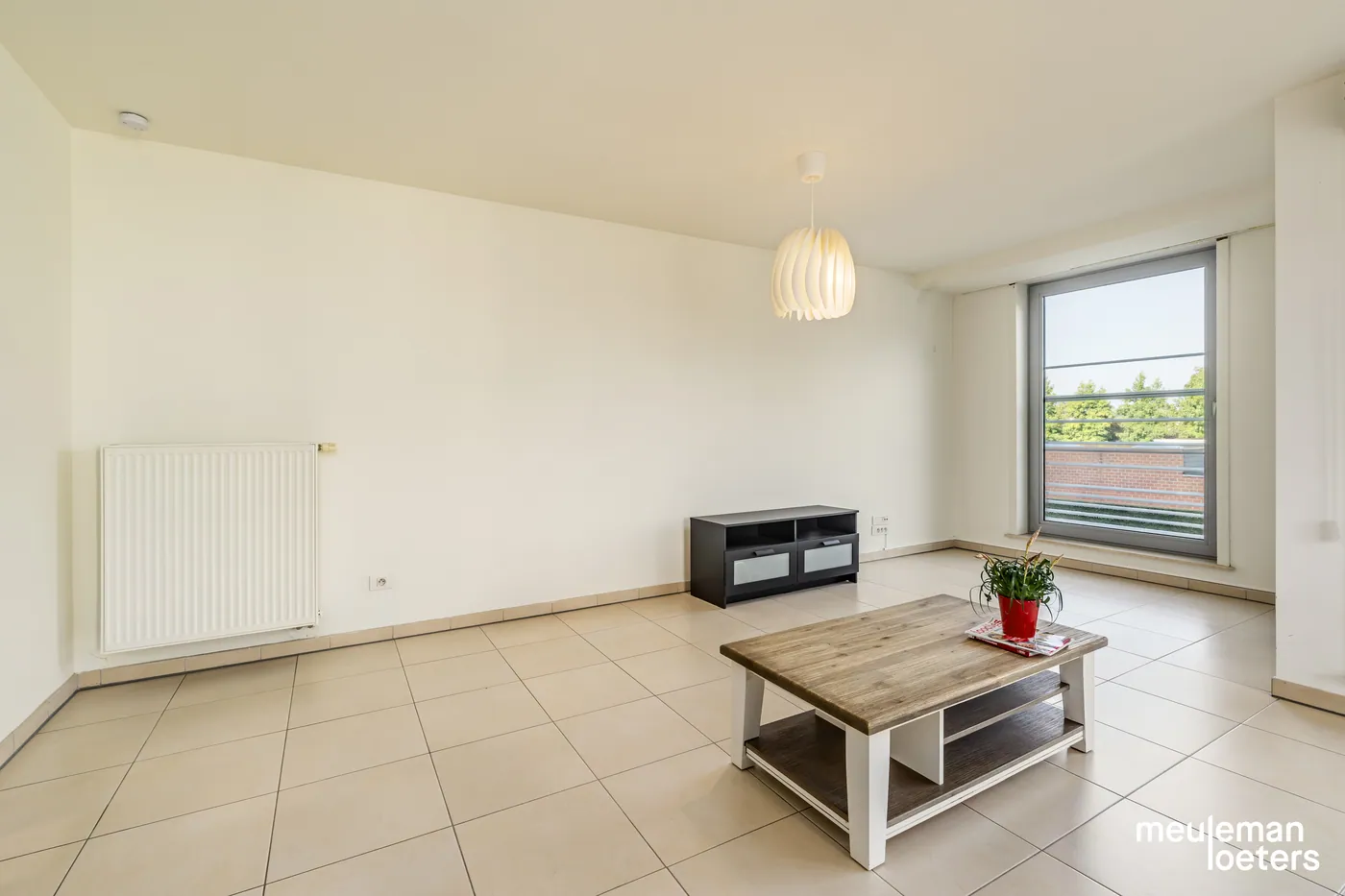 Lichtrijk driegevel appartement met ondergrondse garagebox - foto 4