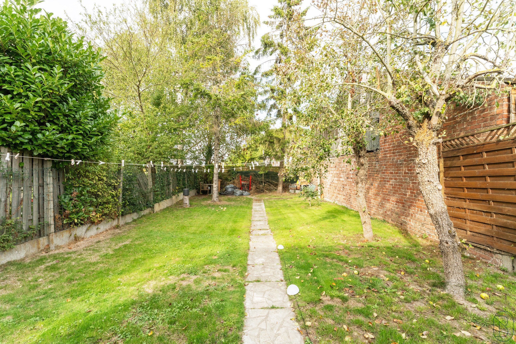 Ruime woning met tuin en handelsgelijkvloers - foto 3