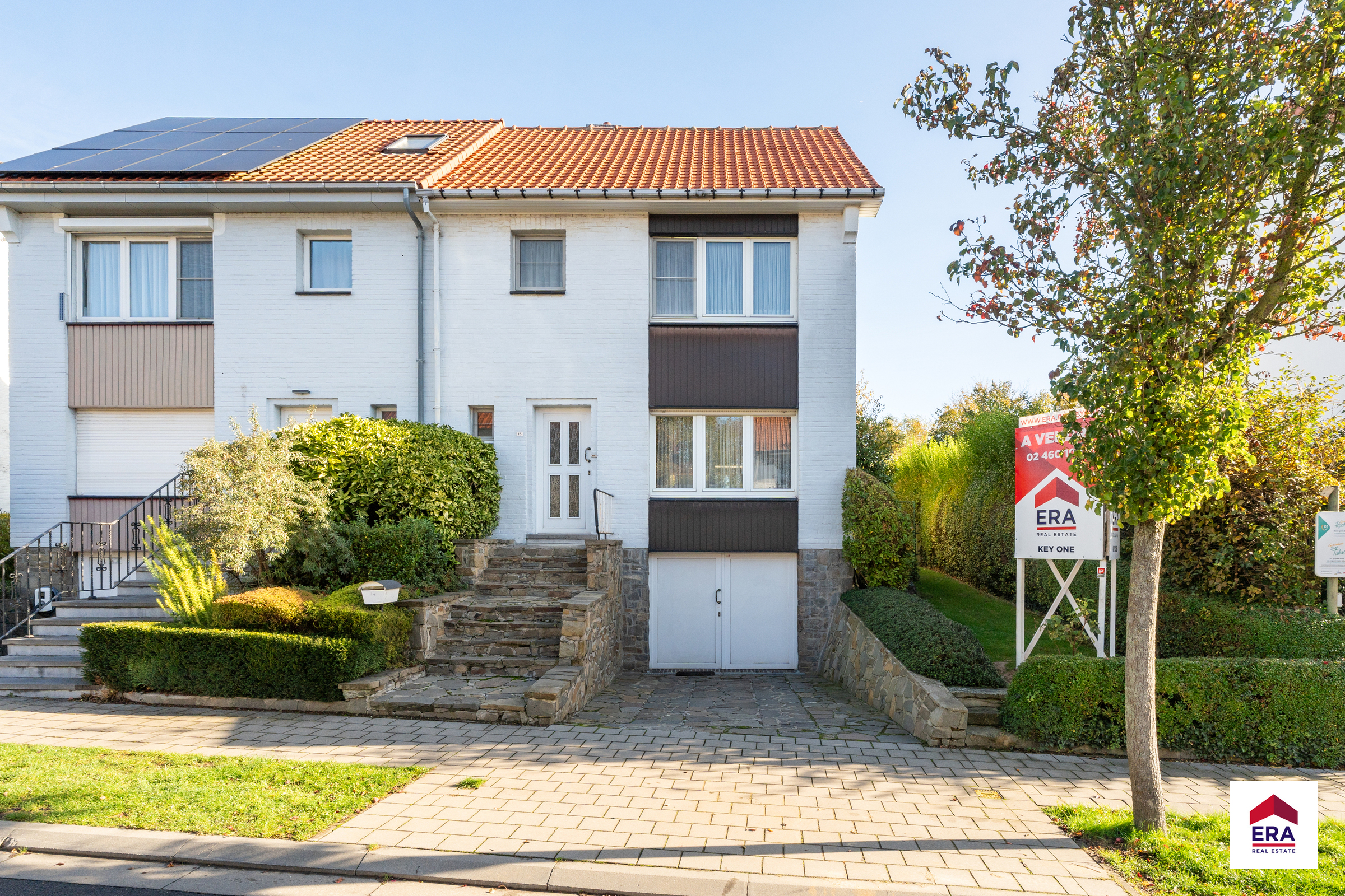 Halfopen woning met tuin in Wemmel - foto 1