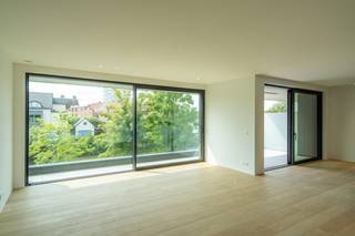 Disposition - 2e étage : - hall d'entrée avec vestiaire et toilettes invités- un espace de vie spacieux avec vue sur la Lys- cuisine ouverte avec...