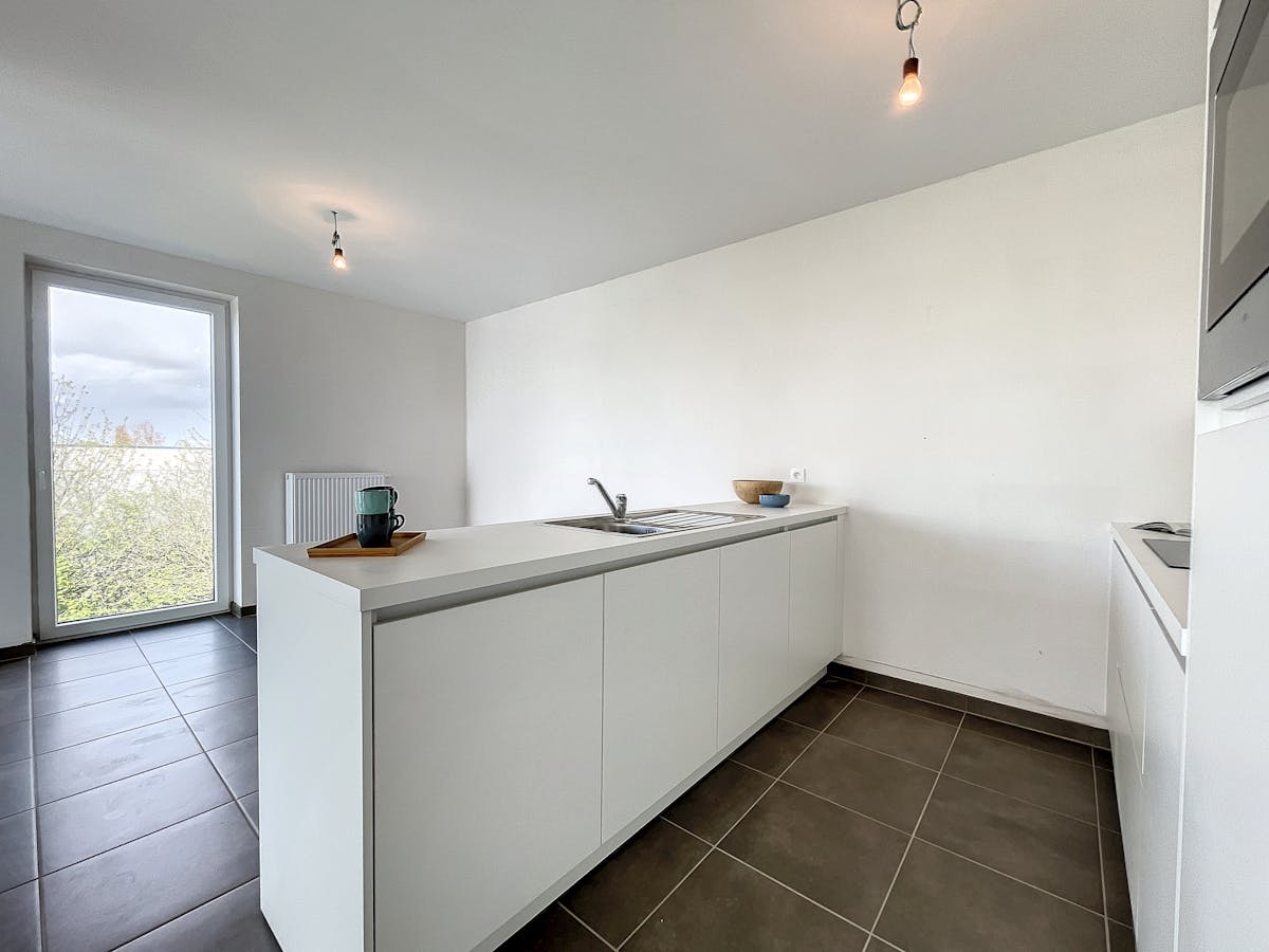 Modern 2-slaapkamerappartement met ruim terras en garagebox - foto 4