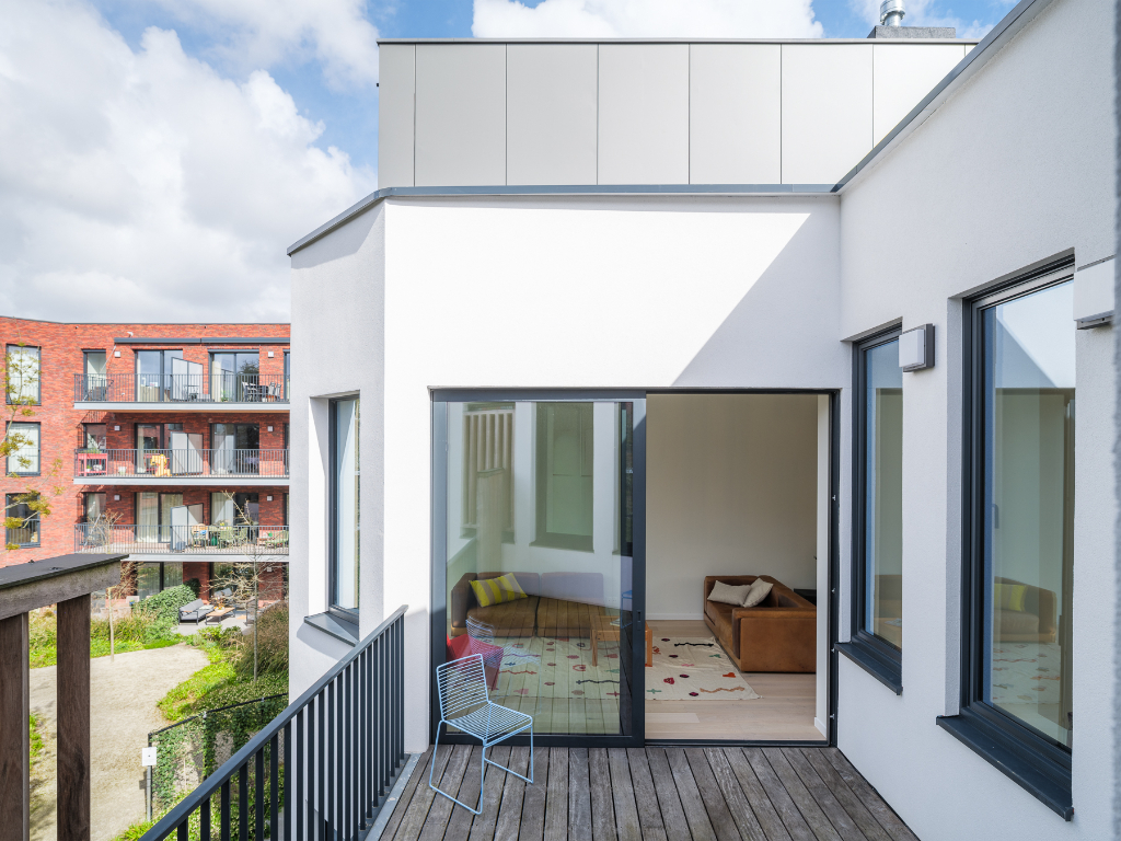 Uniek townhouse-appartement met o.m. 4 slaapkamers, 3 badkamer en een ruim terras. - foto 4