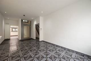 <p><span> </span></p><p><span>Living in the city without sacrificing space? With four bedrooms, two bathrooms, a large open kitchen and a city courtyard, you have a surprising amount of space in this home. Convenient for the less mobile: the house has an elevator and is fully adapted for the disabled.</span></p><p><span> </span></p><p><span>The well-kept entrance hall leads through an automatic sliding door into the living room. The wall-to-wall windows here provide lots of light, the white decorative fireplace for charm. The dining room is located behind the living room and has the same black and white tiles. Additional natural light enters through the glass dome.</span></p><p><span> </span></p><p><span>The open kitchen is fully equipped with a 5-burner gas stove, range hood, dishwasher, double sink, two combination ovens, a hot air oven, steam oven and a spacious fridge-freezer.</span></p><p><span>The kitchen also has a skylight. It opens onto the city courtyard, a pleasant outdoor space with a large tree with beautiful green foliage. This gives you natural shade in summer.</span></p><p><span> </span></p><p><span>Also on the ground floor: a first bathroom with walk-in shower, toilet, hand-washer, and a window for light and natural ventilation.</span></p><p><span> </span></p><p><span>Four full bedrooms</span></p><p><span> </span></p><p><span>On the first mezzanine floor you will find the second, particularly spacious bathroom. It has a large bathtub, a double sink, a toilet and beautiful, plain tiles on the floor and on the wall.</span></p><p><span> </span></p><p><span>For those who cannot climb the stairs on their own: the house has an elevator between the living room, the bathroom on the mezzanine floor and a bedroom on the second floor.</span></p><p><span> </span></p><p><span>The home has a total of four bedrooms, two on each of the upper floors. All of which are finished with laminate flooring. Thanks to the large windows, plenty of light enters each bedroom. </span></p><p><span> </span></p><p><span>Need for storage space? There's plenty of that in the large, dry basement.</span></p><p><span> </span></p><p><span> </span></p><p><span> </span></p><p><span> </span></p><p><span> </span></p><p><span>Close to Park Spoor Noord</span></p><p><span> </span></p><p><span>This residential neighborhood near Park Spoor Noord has everything you're looking for. You can do your daily shopping in one of the many local stores, and for larger purchases you have an Aldi, Lidl and Albert Heijn around the corner. You can swim in the beautiful Art Deco pool in the Veldstraat. By public transport, bicycle or car, you can easily get anywhere in and outside the city. But maybe you don't even want to leave your own neighborhood? The sites of the former Stuivenberg Hospital and the Slachthuis are both being upgraded; the neighborhood will only become more popular in the coming years.</span></p><p><span> </span></p><p><span> </span></p><p><span>Advantages</span></p><p><span> </span></p><p><span>188</span><span> </span><span>m² living space;</span></p><p><span>Four full-size bedrooms;</span></p><p><span>Two bathrooms and three toilets;</span></p><p><span>Urban courtyard with trees;</span></p><p><span>Spacious, dry basement;</span></p><p><span>Indoor elevator to bathroom and bedroom;</span></p><p><span>Double-glazed windows;</span></p><p><span>condensing boiler</span></p><p><span> </span></p><p><span> </span></p>