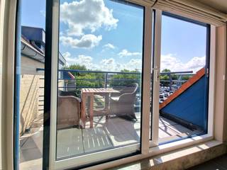 GEZELLIG INSTAPKLAAR 1 SLAAPKAMERAPPARTEMENT MET GROOT ZONNETERRAS GELEGEN IN EEN RECENT GEBOUW OP EEN BOOGSCHEUT VAN DE ZEE EN HET CENTRUM VAN...