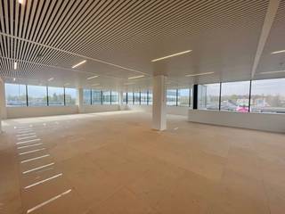 Phenomenally located office space of no less than 1,150 m² for rent, located along and overlooking the busy E40 motorway, near Aalst.<br /><br />These strategically located offices are located on the 5th floor of a modern and high-quality office building, which boasts numerous facilities that make daily work pleasant and efficient. These include a coffee bar for a quick coffee break, a restaurant where you can have lunch without leaving the building, and ample bicycle parking for those coming to work sustainably.<br />In addition, electric charging stations are available in the underground garage, which responds perfectly to today's need for green mobility.<br /><br />One of the biggest assets of this property is its excellent parking ratio of 1/35, meaning that there are ample parking options for both employees and visitors. Accessibility is also fantastic, thanks to its location just off exit 19 Aalst and its proximity to the Erembodegem railway station, which ensures easy access to both public transport and the motorway.<br /><br /><br />Other office surfaces are also available. This office space is available immediately, so do not hesitate to establish your business at this unique prime location and benefit from the excellent visibility along one of the country's main traffic arteries.<br />Would you like more information, detailed plans or a no-obligation site visit? Then contact PANORAMA B2B GENT KANTOREN quickly on 0477 44 39 30.