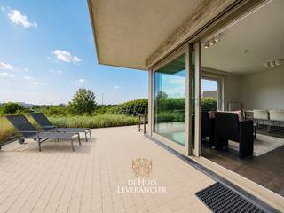 Droom je van een plek waar rust, natuur en comfort centraal staan?Dan zal dit ruime instapklare gelijkvloerse hoekappartement in het exclusieve...