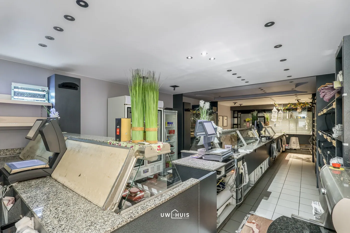 Woning met handelspand en ruim magazijn in het centrum van Ruisbroek - foto 4