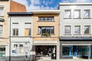 <p>Situated on Wijnstraat, right in the heart of Ronse, these <strong>two adjoining commercial properties offering a combined 304 m² of living space</strong> are being offered for sale together. Two separate character properties with generous proportions and plenty of potential for entrepreneurs, investors or anyone looking to combine living and working under one roof.</p><p> </p><p>One of the properties is currently used as a picture-framing business and comprises several retail, workshop and working areas. The adjoining property is currently vacant, offering complete freedom to renovate and adapt it to suit your own requirements. Both properties are registered in the cadastral records as commercial properties.</p><p> </p><p>There is currently no internal connection between the two buildings: each has its own entrance and individual layout. They can therefore retain separate functions, while together also presenting interesting possibilities for a larger property project, subject to the applicable planning regulations.</p><p> </p><p>The upper floors and attic spaces provide further potential. Combine retail, workshop, office and residential use, invest, or give both properties an entirely new purpose? A variety of options can be explored.</p><p> </p><p>The central location is another major advantage, with the Grote Markt, shops, cafés and restaurants all within walking distance. <strong>No. 11 has an EPC rating of C, while No. 9 has an EPC rating of E.</strong></p><p> </p><p><strong>Two separate properties, a combined 304 m² of living space and plenty of possibilities in a central Ronse location.</strong></p><p> </p><p>Contact Chiara for further information or to arrange a viewing.</p>