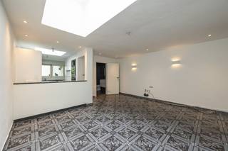 <p><span> </span></p><p><span>Living in the city without sacrificing space? With four bedrooms, two bathrooms, a large open kitchen and a city courtyard, you have a surprising amount of space in this home. Convenient for the less mobile: the house has an elevator and is fully adapted for the disabled.</span></p><p><span> </span></p><p><span>The well-kept entrance hall leads through an automatic sliding door into the living room. The wall-to-wall windows here provide lots of light, the white decorative fireplace for charm. The dining room is located behind the living room and has the same black and white tiles. Additional natural light enters through the glass dome.</span></p><p><span> </span></p><p><span>The open kitchen is fully equipped with a 5-burner gas stove, range hood, dishwasher, double sink, two combination ovens, a hot air oven, steam oven and a spacious fridge-freezer.</span></p><p><span>The kitchen also has a skylight. It opens onto the city courtyard, a pleasant outdoor space with a large tree with beautiful green foliage. This gives you natural shade in summer.</span></p><p><span> </span></p><p><span>Also on the ground floor: a first bathroom with walk-in shower, toilet, hand-washer, and a window for light and natural ventilation.</span></p><p><span> </span></p><p><span>Four full bedrooms</span></p><p><span> </span></p><p><span>On the first mezzanine floor you will find the second, particularly spacious bathroom. It has a large bathtub, a double sink, a toilet and beautiful, plain tiles on the floor and on the wall.</span></p><p><span> </span></p><p><span>For those who cannot climb the stairs on their own: the house has an elevator between the living room, the bathroom on the mezzanine floor and a bedroom on the second floor.</span></p><p><span> </span></p><p><span>The home has a total of four bedrooms, two on each of the upper floors. All of which are finished with laminate flooring. Thanks to the large windows, plenty of light enters each bedroom. </span></p><p><span> </span></p><p><span>Need for storage space? There's plenty of that in the large, dry basement.</span></p><p><span> </span></p><p><span> </span></p><p><span> </span></p><p><span> </span></p><p><span> </span></p><p><span>Close to Park Spoor Noord</span></p><p><span> </span></p><p><span>This residential neighborhood near Park Spoor Noord has everything you're looking for. You can do your daily shopping in one of the many local stores, and for larger purchases you have an Aldi, Lidl and Albert Heijn around the corner. You can swim in the beautiful Art Deco pool in the Veldstraat. By public transport, bicycle or car, you can easily get anywhere in and outside the city. But maybe you don't even want to leave your own neighborhood? The sites of the former Stuivenberg Hospital and the Slachthuis are both being upgraded; the neighborhood will only become more popular in the coming years.</span></p><p><span> </span></p><p><span> </span></p><p><span>Advantages</span></p><p><span> </span></p><p><span>188</span><span> </span><span>m² living space;</span></p><p><span>Four full-size bedrooms;</span></p><p><span>Two bathrooms and three toilets;</span></p><p><span>Urban courtyard with trees;</span></p><p><span>Spacious, dry basement;</span></p><p><span>Indoor elevator to bathroom and bedroom;</span></p><p><span>Double-glazed windows;</span></p><p><span>condensing boiler</span></p><p><span> </span></p><p><span> </span></p>