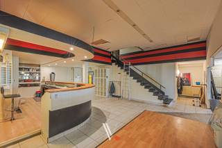 Dit indrukwekkende, te renoveren gelijkvloerse handelspand van <strong>663 m²</strong> biedt u de unieke kans om een zaak volledig naar eigen hand en concept op te bouwen.<br /><br /><strong>Commerciële locatie</strong><br />Het pand ligt op een goede locatie in de Stationsstraat, op wandelafstand van de Markt en het station. U geniet hier van een constante stroom passanten en een uitstekende bereikbaarheid.<br />Bovendien is er ruime publieke parkeergelegenheid vlakbij (o.a. Wijngaardparking).<br /><br /><strong>Grootste troeven</strong>
<ul>
<li><span><strong>Visibiliteit</strong>.</span></li>
<li><span><strong>Flexibele invulling:</strong> Ideaal voor retail, showroom, kantoor, praktijkruimte of studio.</span><br /> </li>
</ul>
<strong>Indeling</strong>
<ul>
<li><span><strong>Gelijkvloers:</strong> Een lange inkomhal met aparte sanitaire voorzieningen (D/H) leidt naar een enorme, polyvalente open ruimte met bar-zone. Perfect moduleerbaar tot onthaal, open werkvloer, vergader- of behandelruimtes en stockageruimte.</span></li>
<li><span><strong>Verdieping:</strong> Ingericht met kleedkamers (D/H), op te frissen of te herbestemmen.</span><br /> </li>
</ul>
<strong>Kort en bondig:</strong> 663 m² oppervlakte | EPC NR: Label X | <em>Bestemming onder voorbehoud van lokale vergunningen.</em>