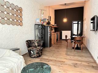 Gemeubeld appartement met 1 slaapkamer op 't Eilandje! Je wandelt het appartement binnen in de woonkamer met open keuken. De woonkamer is voorzien...