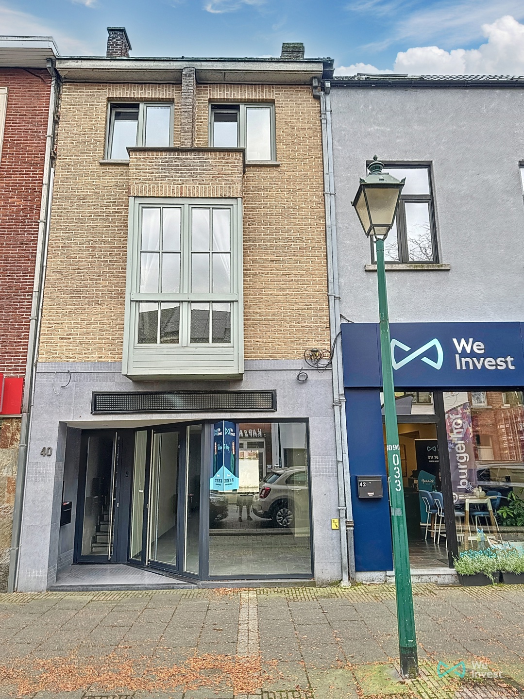 Verrassend ruim triplexappartement en aparte handelsruimte. - foto 1