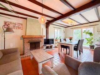 CHARMANTE OPEN BEBOUWING met zonnige tuin en GARAGE gelegen in een rustige wijk in Nazareth. Binnen geniet je van een gezellige leefruimte MET...