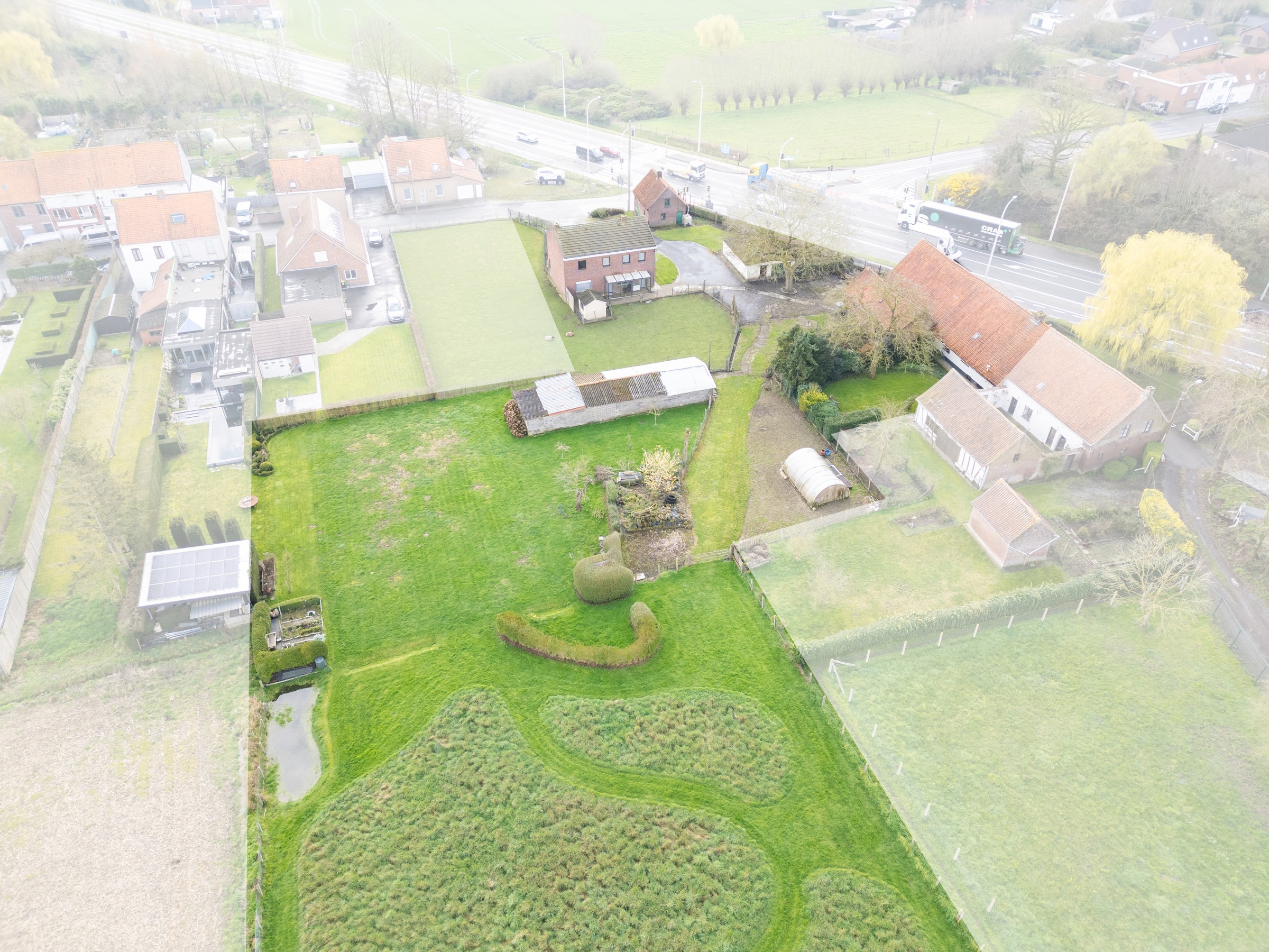 Ruim perceel met commerciële ligging langs Rijksweg/N36 - foto 5