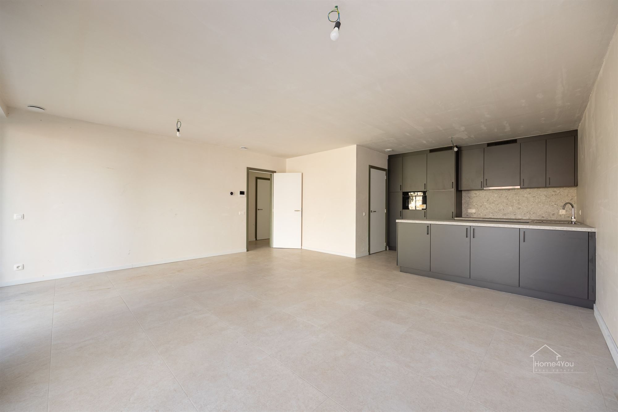 Nieuwbouw gelijkvloers appartement met aangename tuin - foto 4