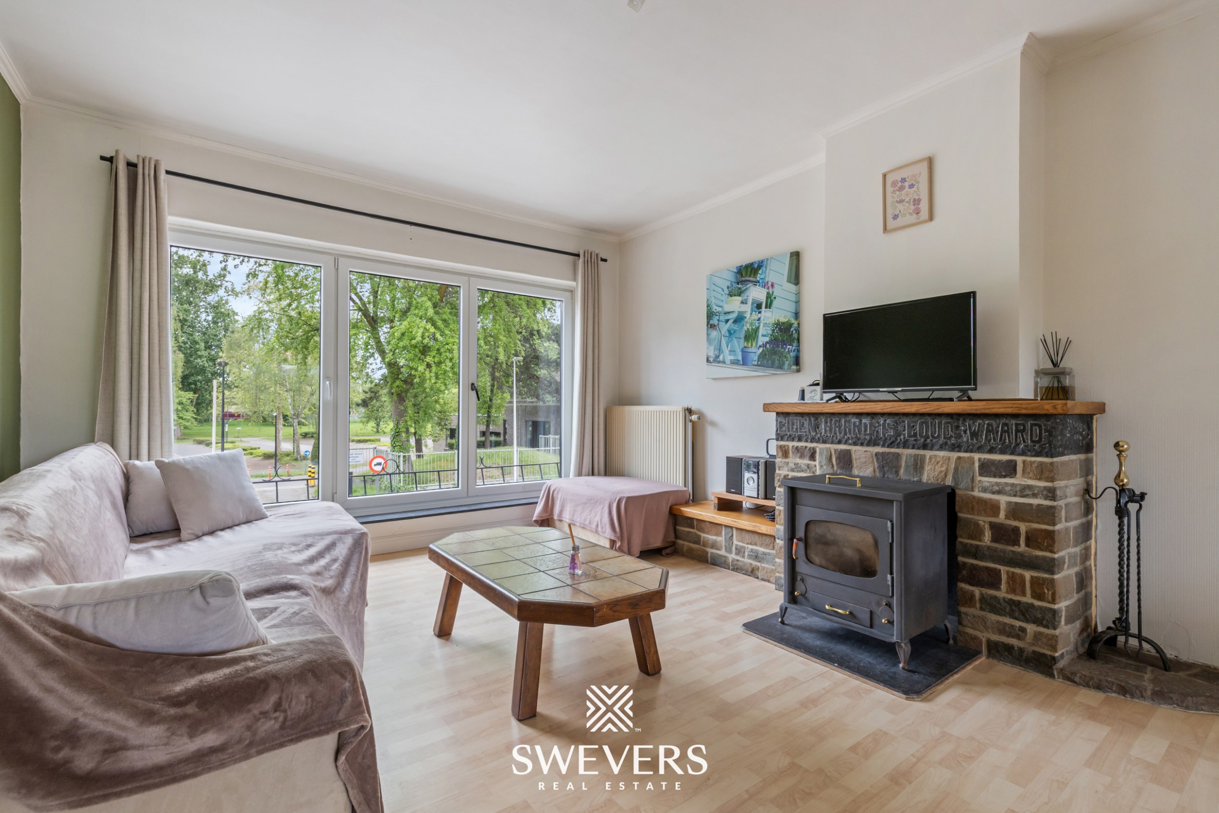 Instapklare rijwoning met 2 zeer ruime slaapkamers en uitstekende ligging - foto 5