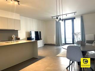 <p><span>Modern and newly built 2-bedroom apartment in the Harmonie neighborhood!</span></p><p><span>Just a stone’s throw from the center of Lint lies the park residence "Greenhouse", a small-scale, quietly located, and energy-efficient new construction project. Those who love greenery will find complete peace and quiet here, yet it’s still close to major roads, shops, and more.</span></p><p><span>The apartment at has just been thoughtfully furnished. It is located on the ground floor. The spacious entryway leads to the living room with an open kitchen, where you’ll be greeted by an abundance of natural light. There are also two bedrooms, a bathroom, and a storage room with connections for a washing machine and dryer. </span></p><p><span>From the living room and the bedroom, you have a view of the green garden, and through a large sliding window, you can step directly out onto the terrace from the living room.</span></p><p><span> </span></p><p><span>The “ ” apartment is laid out as follows: </span></p><p><span>Entrance Hall:</span><span><br />You enter the apartment through the entrance hall. This hall offers space for a coat closet and provides access to the guest restroom with a sink.</span></p><p><span>Living Area and Kitchen:</span><span><br />From the entry hall, you enter the spacious living room with an open, high-quality kitchen. The brand-new kitchen is equipped with a large refrigerator, a combination oven/microwave, an induction cooktop, and a double sink.</span></p><p><span>Adjacent to the kitchen is a large open living area that accommodates a spacious dining table and a cozy TV corner. Thanks to the large windows, the space is flooded with natural light, and you have direct access to the adjoining patio and garden.</span></p><p><span> & 's Bathroom and Bedrooms:</span><span><br />The bathroom features a large walk-in shower with a tiled wall that creates a spacious feel. There is also a sink with matching cabinets in the same stylish finish.</span></p><p><span>The two bedrooms feature large windows with direct access to the backyard, where you can enjoy a delicious morning coffee without a care in the world.</span></p><p><span>Garden, garage, and basement:</span><span><br />With a garden on both the side and the back of the apartment, you’ll always find a spot in the sun, while still enjoying plenty of privacy. The apartment also comes with a private basement storage unit and a parking space.</span></p><p><span> </span></p><p><span>Additional Highlights:</span></p><p><span>- lift</span></p><p><span>- large terrace</span></p><p><span>- plenty of natural light</span></p><p><span>- Basement and parking space</span></p><p><span>- Energy-efficient: heat pump heating; E-rating 10</span></p><p><span>- Separate meters for water and electricity</span></p><p><span> </span></p><p><span>Rent & </span><span>Availability<br />Monthly rent</span><span>: € 1050</span></p><p><span>Monthly expenses:</span><span> € 100/month—common area utilities, maintenance, and heating allowance</span></p><p><span>Available:</span><span> immediately</span></p><p><span>Inspection fee:</span><span> 250 € per viewing</span></p><p><span> </span></p><p><span>Interested in this modern apartment and want to be the first to</span></p>