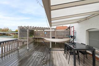 Dit ruime duplexappartement van 155m² in Wommersom met twee slaapkamers en een terras biedt een unieke combinatie van wonen, ruimte en potentieel...