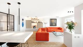 Luxuriously renovated flat on the Zeedijk, close to Rubensplein. The entrance hall is equipped with a cloakroom, a guest toilet and a laundry room. The spacious living room with frontal sea view (7m façade width), offers a bright living space that connects to a fully fitted open kitchen. The flat features two spacious bedrooms. The master bedroom has a dressing room and its own ensuite bathroom. The second bedroom features fitted wardrobes, a desk area and an en suite shower room.<br /><br />The recent renovation was carried out by the firm Chrisma, known for their high-quality finishes. The flat comes with two basement rooms and a bike shed on level -1.<br /><br />EPC: A-label (85) [1853112].