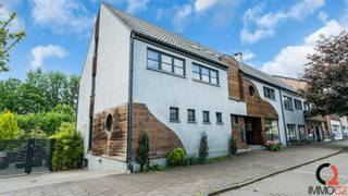 Exclusief gelijkvloers appartement met privatieve tuin, ruim terras en ondergrondse polyvalente ruimte nabij centrum GenkOp een absolute toplocatie...