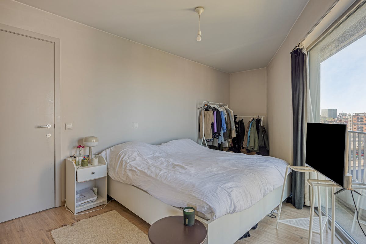 Lichtrijk eenslaapkamerappartement met terras te koop - foto 5