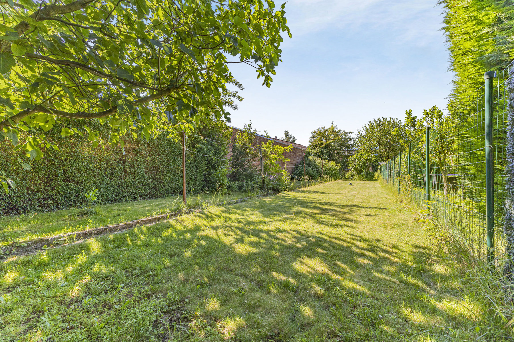 Goed gelegen woning met garage en grote tuin - foto 4