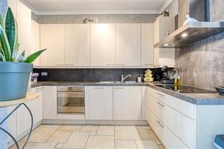 house for sale in the Bosstraat in Boom<br />layout:<br />ground floor:<br />- spacious living room<br />- fully equipped kitchen<br />- hobby room/storage/garden house (next to the kitchen)<br />- toilet<br />- maintenance-friendly garden<br />- spacious garage<br />first floor:<br />- bedroom 1 (approx. 23m²)<br />- bathroom with double sink, shower and toilet<br />attic floor:<br />- bedroom 2 (approx. 32m²) (possibility to split into 2 rooms)<br />There is also a dry cellar.<br /><br />Location: This house for sale in Boom is located in the Bosstraat, next to the De Schorre recreation area in Boom. Antwerp, Brussels and Mechelen are easily and quickly accessible via the A12 (5 min) and E19 (10 min).<br /><br />Details:<br />- half open<br />- garage<br />- garden<br />- electricity compliant<br />- possibility for 3 bedrooms<br />- near De Schorre<br /><br />Are you looking for a spacious, ready-to-move-in house for sale in Boom? Please feel free to contact one of our colleagues at Dewaele real estate.<br /><br />The property is offered through the Pre-sale formula. On 05/09/2026 between 10:00 and 14:00, you can come visit the house by appointment and make an offer. The listed price is a starting price. For further information, please contact the property agent.<br /><br />Register of measures: no