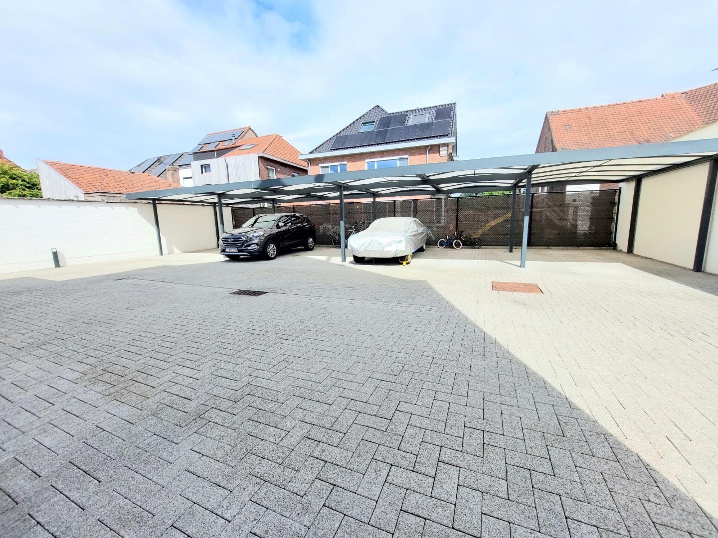 Overdekte autostaanplaats - foto 2