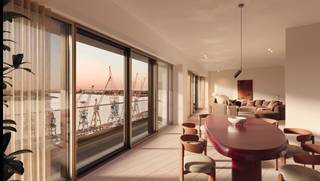 <p><span>Genesteld tussen het water van de Schelde en het Bonapartedok vindt Friendship Residence haar plek, als een eerbetoon aan de rijke geschiedenis van deze bijzondere locatie. Hier smelt het levendige ritme van de stad samen met de rust van het water.</span><br /><span><br />Voor het ontwerp van Friendship Residence bundelden het Antwerpse bureau HUB Archi- tecten en het Londense DRDH Architects lokale voeling en internationaal perspectief.</span><br /><br />De uitstraling van Friendship Residence is van buitenaf meteen indrukwekkend. Hoogwaardige gevels met groene accenten, verfijnde detaillering en royale raampartijen vormen een esthetische verrijking voor de omgeving. Er is bewust gekozen voor minerale materialen die de locatie eer aandoen, variërend van de kenmerkende pakhuisstijl tot stadsgebouwen met baksteenaccenten.<br /><br />Die kwaliteit voelt u tot in de kleinste details bij aankomst. Via de luxueuze inkompartijen betreedt u de gebouwen, een stijlvolle overgang van de stad naar uw persoonlijke haven.<br /><br />Voor het ontwerp van de royale binnentuin tekende de gerenommeerde landschapsarchitect Erik Dhont. Met internationale realisaties én als laureaat van de prestigieuze wedstrijd voor de nieuwe paleistuinen in Brussel, staat dit bureau garant voor een ontwerp van koninklijke klasse.<br /><br />De charme van deze verborgen oase nodigt uit tot vertragen en beleven. Een samenspel van bloemen, struiken en bomen creëert een luwte die het tempo van de stad even doet vergeten. Natuurstenen paden leiden u langs een spiegelvijver, met rustpunten om te genieten van zon en schaduw.</p>
<div>
<div>
<div>
<div>
<div>
<div>
<div>
<div>
<div>
<div>
<div>
<div>
<div>
<div>
<div>
<div>
<p><span>Vanuit blok B ervaart u adembenemende, panoramische zichten over de Scheldebocht, historische havenkranen en de prachtige binnentuin. Zowel verfijnde appartementen van 95 m2 als riante residenties tot 426 m2 geven blok B vorm. Allen pakken ze uit met optimale oriëntaties en weidse hoekterrassen voor spectaculaire zonsondergangen. </span></p>
<p><span>Kom tot rust in de omvangrijke leefruimtes die het geheel extra royaal doen aanvoelen. De luxueuze raampartijen zorgen vervolgens voor een uitzonderlijke lichtbeleving, waar daglicht zacht binnenvalt en elke ruimte een warme uitstraling krijgt.</span></p>
<p><span>Parking aan te kopen vanaf 45.000 euro</span></p>
</div>
</div>
</div>
</div>
</div>
</div>
</div>
</div>
</div>
</div>
</div>
</div>
</div>
</div>
</div>
</div>