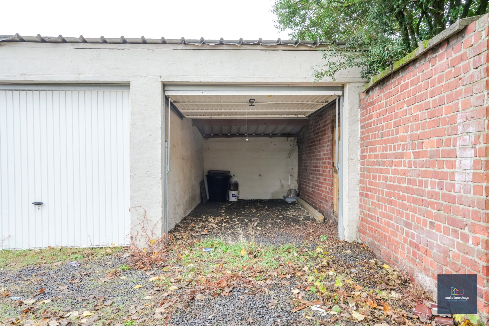 Ruim gelijkvloersappartement met 2 slaapkamers , een zuidgeorienteerde tuin en garage - foto 4