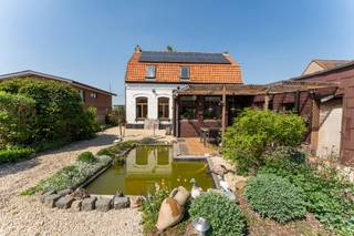 Charmante woning op rustige locatie in Heule te koopDeze charmante woning in Sint-Katarina (Heule) is gelegen op een zuidgeoriënteerd perceel van 514...