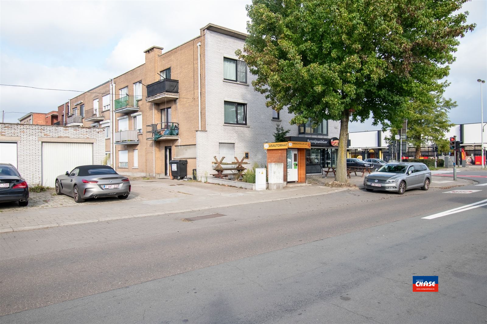 Handelspand met appartement en garagebox - foto 4