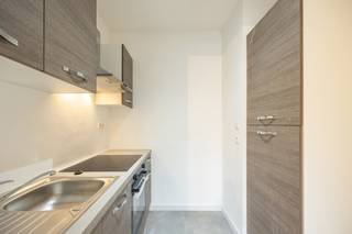 In the vibrant Harmoniewijk, you will find this bright studio with terrace. <br /><br />The living space has a new parquet floor, with a view of greenery and a terrace where the sun shines from 11.30 am throughout the afternoon.<br />In the hall there is a storage cupboard and a large built-in wardrobe.<br /><br />The new fresh kitchen is very comfortably furnished. The bathroom has a shower, a toilet and a sink.<br /><br />The very nice location, within walking distance of shops, restaurants, catering, makes it a very interesting investment for rental.<br /><br />Newly installed in 2024:<br />The electricity has been completely renewed, the apartment has just been painted, new exterior joinery, new tiles in the bathroom, new parquet, new kitchen.