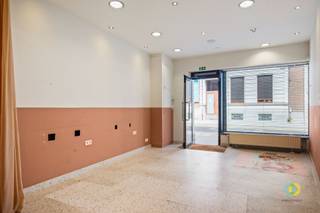 <p><span>Vilvoorde: Don’t be fooled by the width of the building on the ground floor, because on the upper floors, part of the building above the passageway is also part of this property! </span></p><p><span>On the ground floor, there’s space for a commercial unit (38 m²), fully equipped as a hair salon. Everything remains in place, so you can start your own hair salon, beauty salon, or… right away. There is a separate restroom, and at the back is a kitchen that can serve as a storage room or office. There is also a basement. </span></p><p><span>After the entire ground floor was renovated and furnished, the owners began work on the upper floors a few years ago. </span></p><p><span>The first floor now features a living area (36.5 m²) that is bathed in light thanks to the large windows. The kitchen (6.5 m²) opens onto the living area and is equipped with all modern conveniences. </span></p><p><span>On the next floor, you’ll find the first bedroom (19 m²), large enough to accommodate two children. The bathroom features a bathtub with a shower. </span></p><p><span>The attic (22 m²) has also been fully converted into a second, spacious room. </span></p><p><span>As you can see, this is definitely a great option even with two children. </span></p><p><span>An added bonus of the building is the rear side entrance. This would allow you to create a vestibule, providing a separate entrance to the apartment—ideal if you’d like to rent out all or part of it.</span></p><p><span>The owners currently rent a garage; you could choose to take over that lease.</span></p><p><span> </span></p>