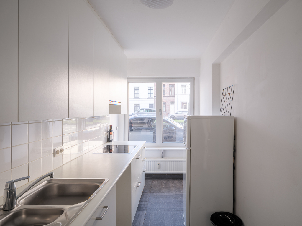 Instapklaar 2 slaapkamer appartement met terras en zonnige tuin - photo 4